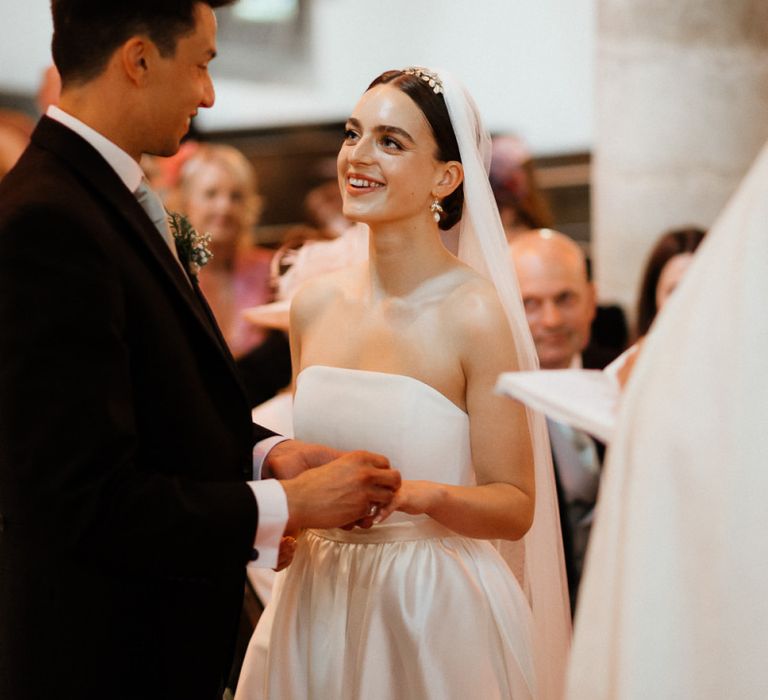 Bride In Strapless Wedding Dress For Church Ceremony