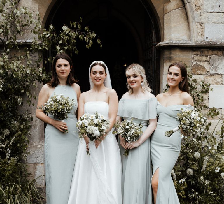 Bride in Strapless Halfpenny London Wedding Dress And Blues Green Bridesmaid Dresses