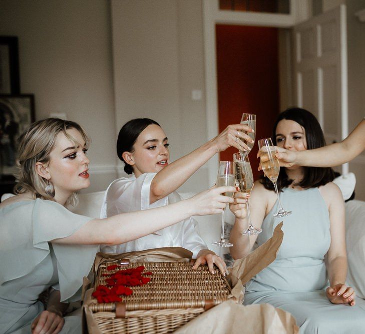 Bridesmaids Getting Ready And Toasting The Day