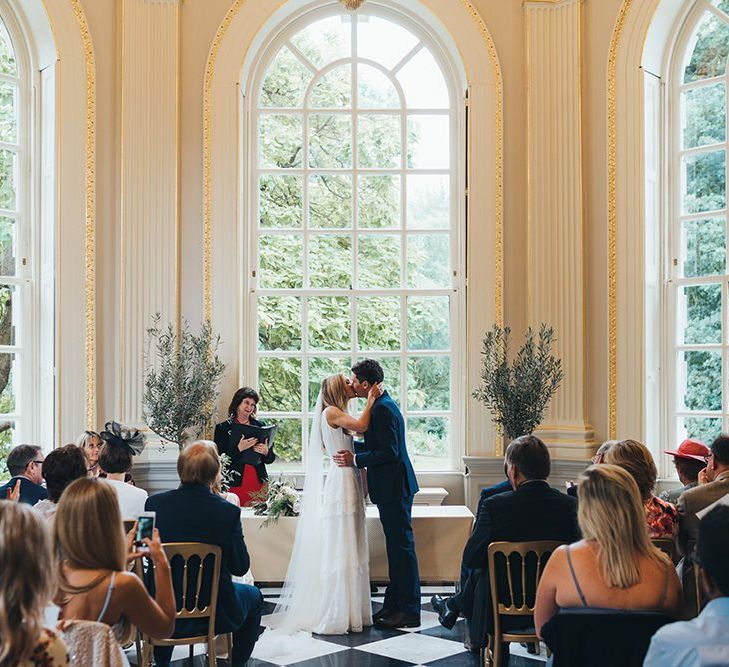 Bride and Groom Kiss in Orleans House Gallery Wedding Venue