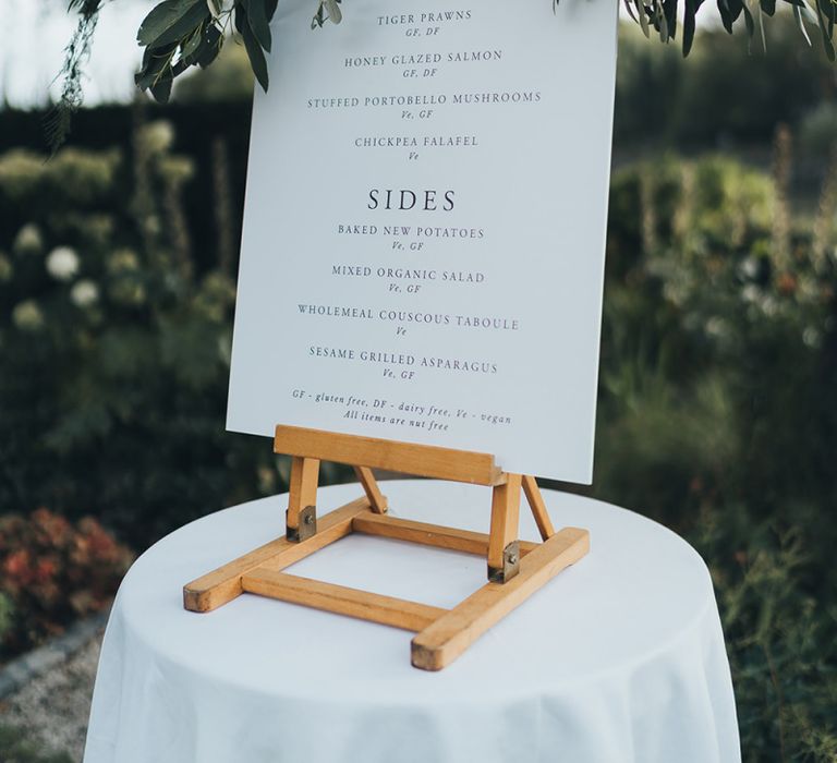 Simple Wedding Menu Sign with Foliage Decor