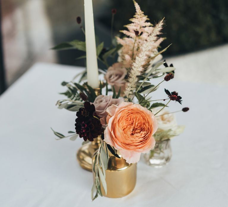 Simple Floral Centrepieces with Candle and Gold Highlights