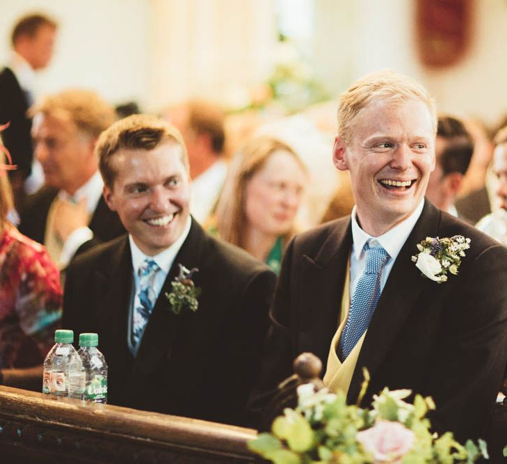 Groom Sitting at the Altar in a Morning Suit