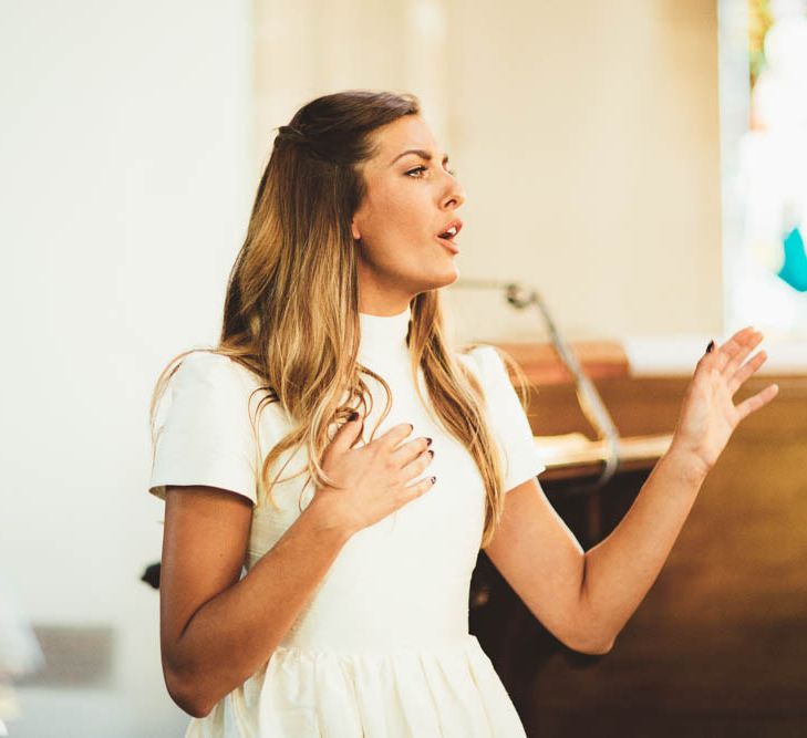 Maid of Honor Singing Edleweiss During The Church Wedding Ceremony