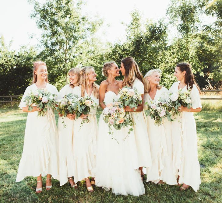 Bridal Party in White Dresses and Bride in HalfPenny London Wedding Dress