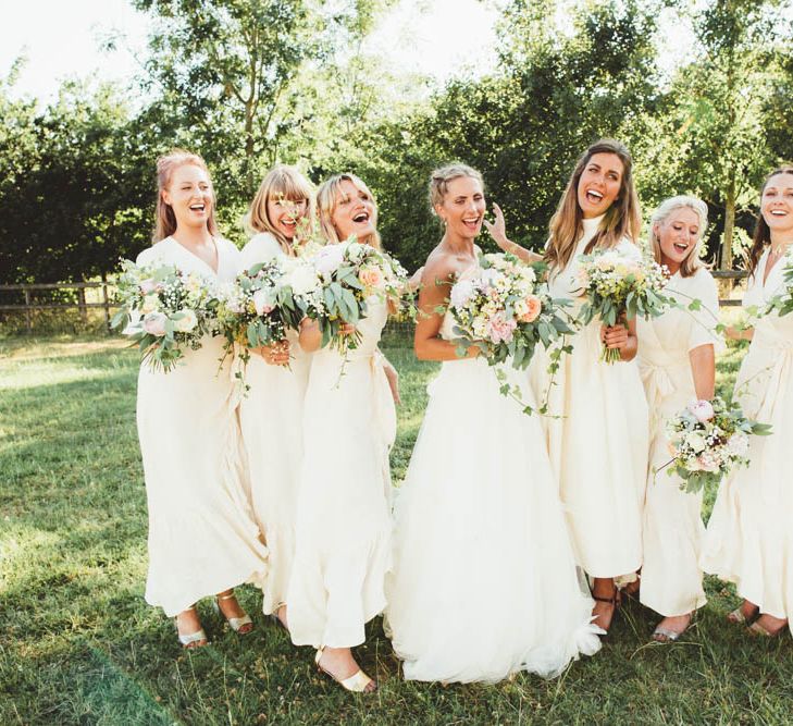 Bridal Party Portrait with Bridesmaids  in White Dresses and Bride in HalfPenny London Wedding Dress