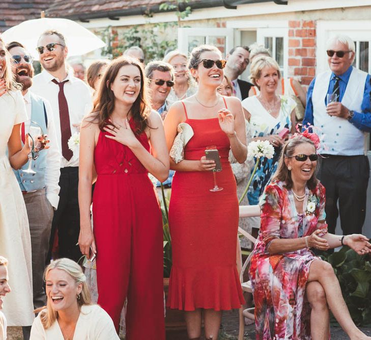 Wedding Guests Laughing During Wedding Speeches