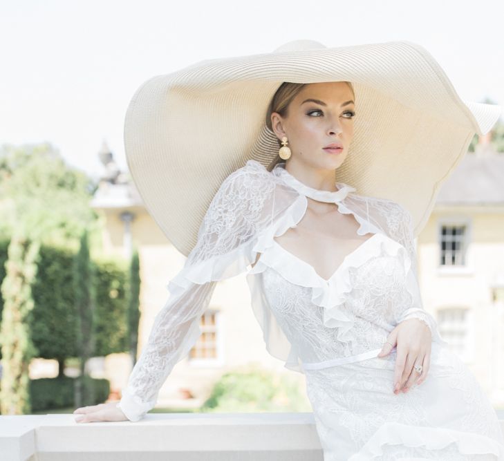 Bri ein giant straw hat for Italian micro themed wedding