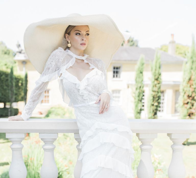 Bride in lace and ruffle wedding dress with star hat for Italian micro themed wedding