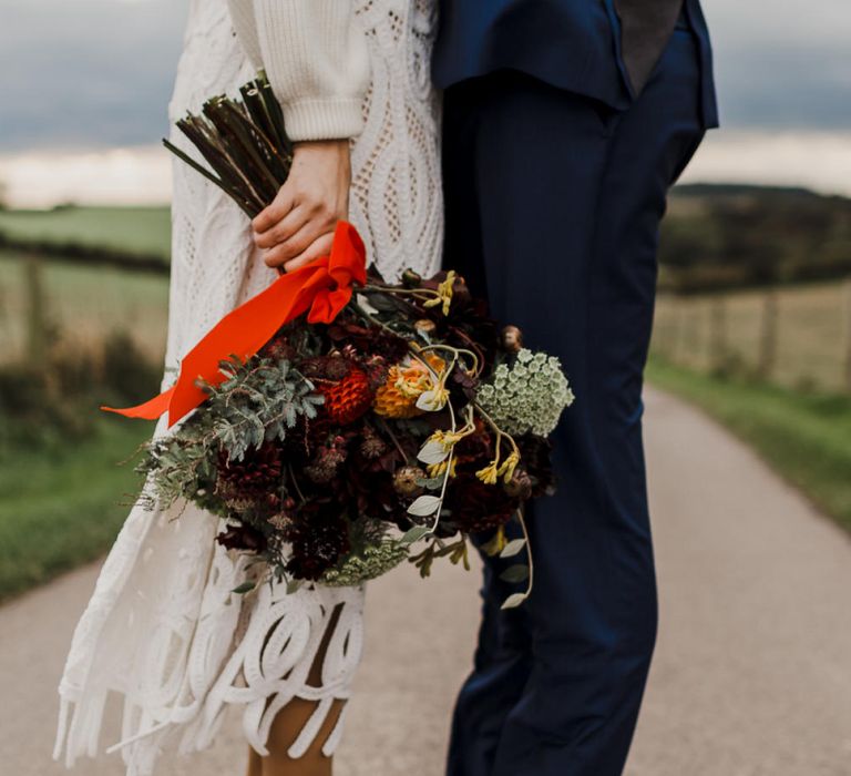 Orange and Red Dahlia Wedding Bouquet with Ribbons