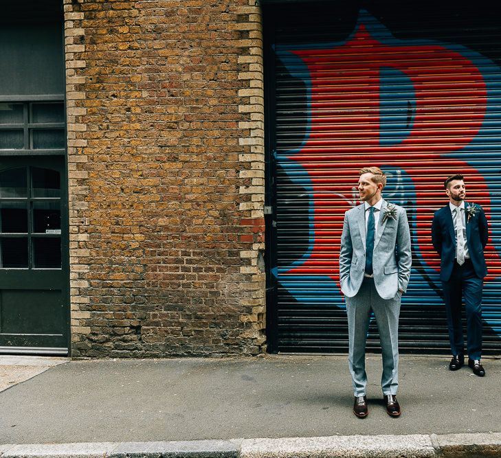 Pre-Ceremony Photos in Shoreditch | Groom in Dark Petrol Blue Suit by Paul Smith | Groom in Light Blue Made-To-Measure Suit by Beggars Run | Dark Brown Russell &amp; Bromley Shoes | Brown Aldo Shoes | Same Sex Wedding with Industrial Styling at Wimborne House | Marmelo Photography