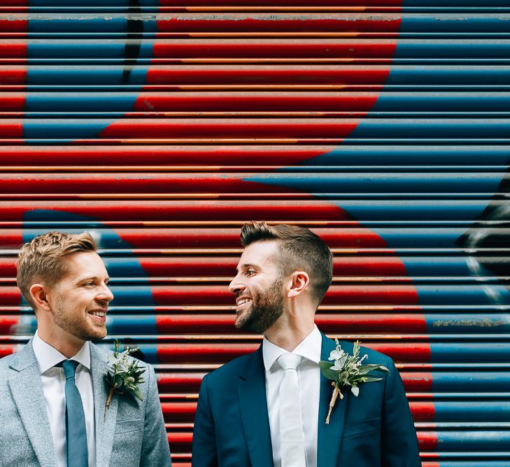 Pre-Ceremony Photos in Shoreditch | Groom in Dark Petrol Blue Suit by Paul Smith | Groom in Light Blue Made-To-Measure Suit by Beggars Run | Same Sex Wedding with Industrial Styling at Wimborne House | Marmelo Photography