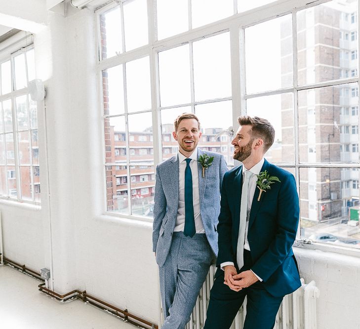 Groom in Dark Petrol Blue Suit by Paul Smith | Groom in Light Blue Made-To-Measure Suit by Beggars Run | Huge Warehouse Windows | Same Sex Wedding with Industrial Styling at Wimborne House | Marmelo Photography