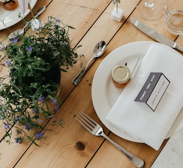 Wedding Reception Decor | Marmalade Wedding Favours | Trestle Table | Potted Plants | Place Settings | Same Sex Wedding with Industrial Styling at Wimborne House | Marmelo Photography