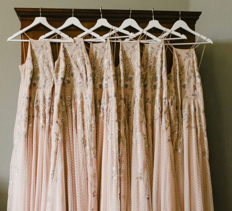 Pink bridesmaids dresses with embroidery detail