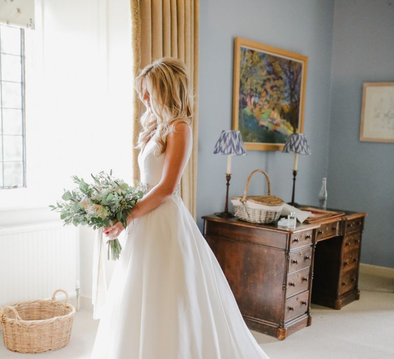 Bride on wedding morning in Sassi Holdford wedding dress