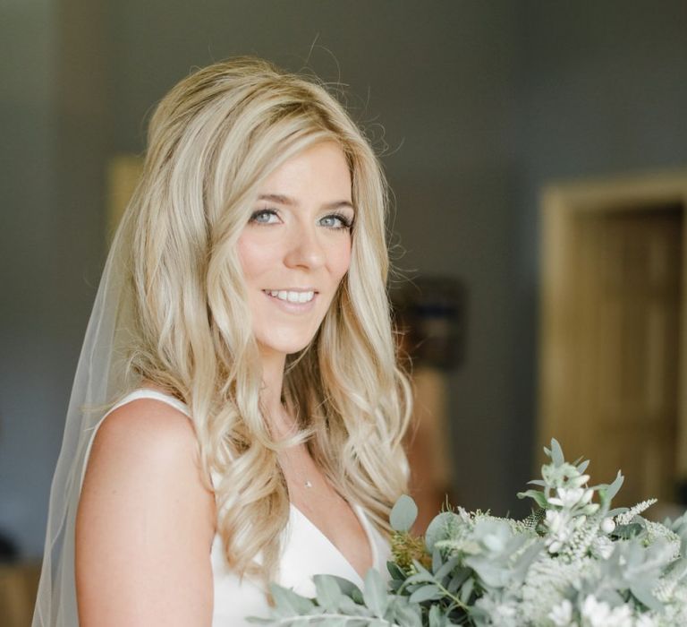 Natural bridal hair and makeup with long blonde hair