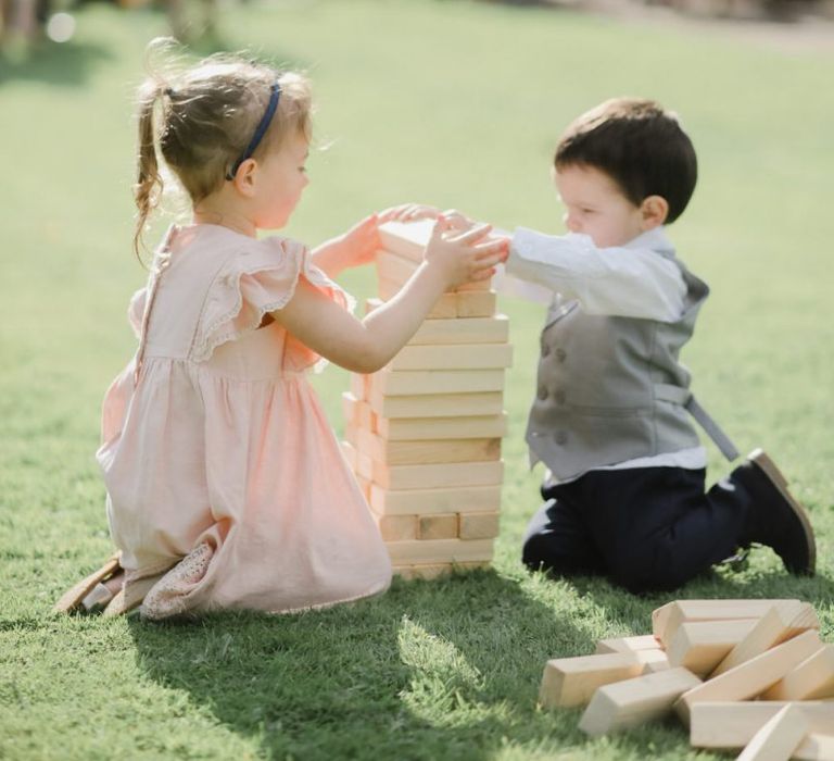 small wedding guests playing garden games