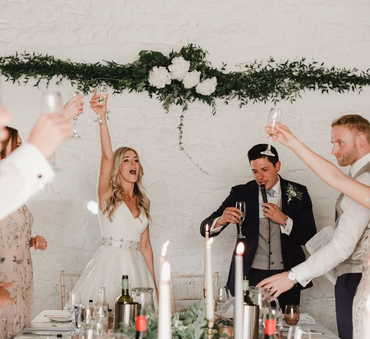 Wedding toast at Askham Hall