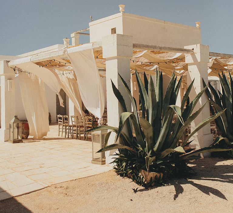 Outdoor Aisle &amp; Altar Style | Brightly Coloured Destination Wedding at Masseria Potenti Wedding Venue, Puglia, South Italy | Petar Jurica Photography | Marco Odorino Film