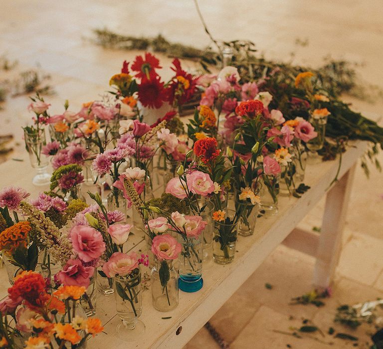 Wedding Flower Stems in Vases | Brightly Coloured Destination Wedding at Masseria Potenti Wedding Venue, Puglia, South Italy | Petar Jurica Photography | Marco Odorino Film