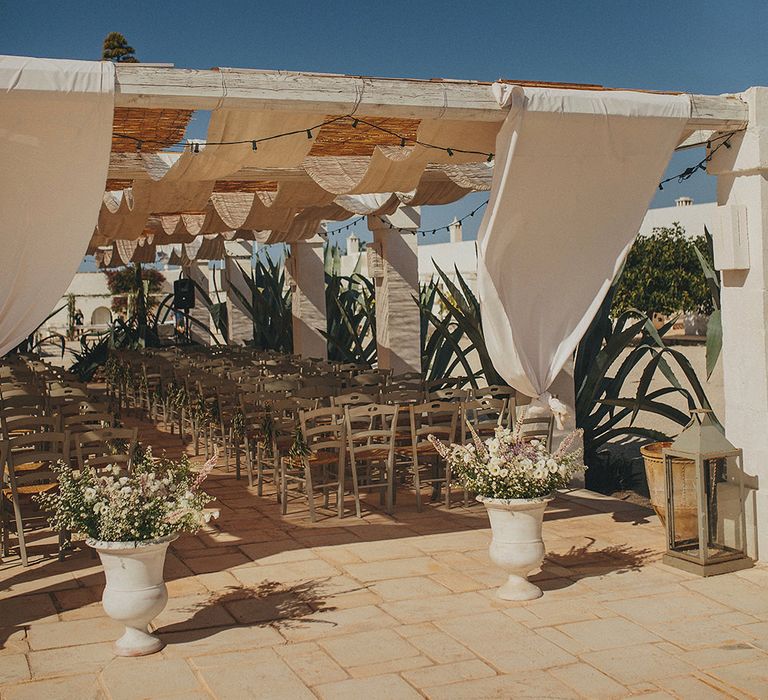 Outdoor Aisle &amp; Altar Style | Brightly Coloured Destination Wedding at Masseria Potenti Wedding Venue, Puglia, South Italy | Petar Jurica Photography | Marco Odorino Film