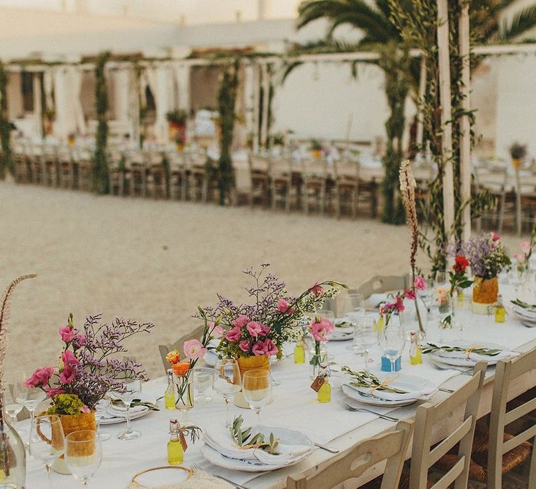 Outdoor Wedding Reception with Vines | Brightly Coloured Destination Wedding at Masseria Potenti Wedding Venue, Puglia, South Italy | Petar Jurica Photography | Marco Odorino Film