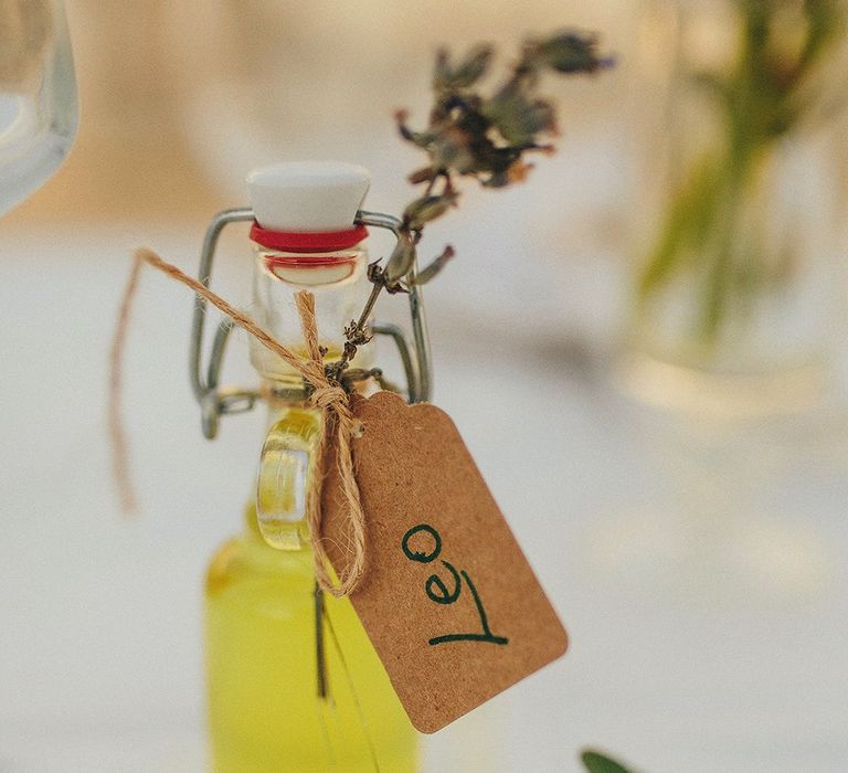 Homemade Limoncello  Wedding Favours | Brightly Coloured Destination Wedding at Masseria Potenti Wedding Venue, Puglia, South Italy | Petar Jurica Photography | Marco Odorino Film