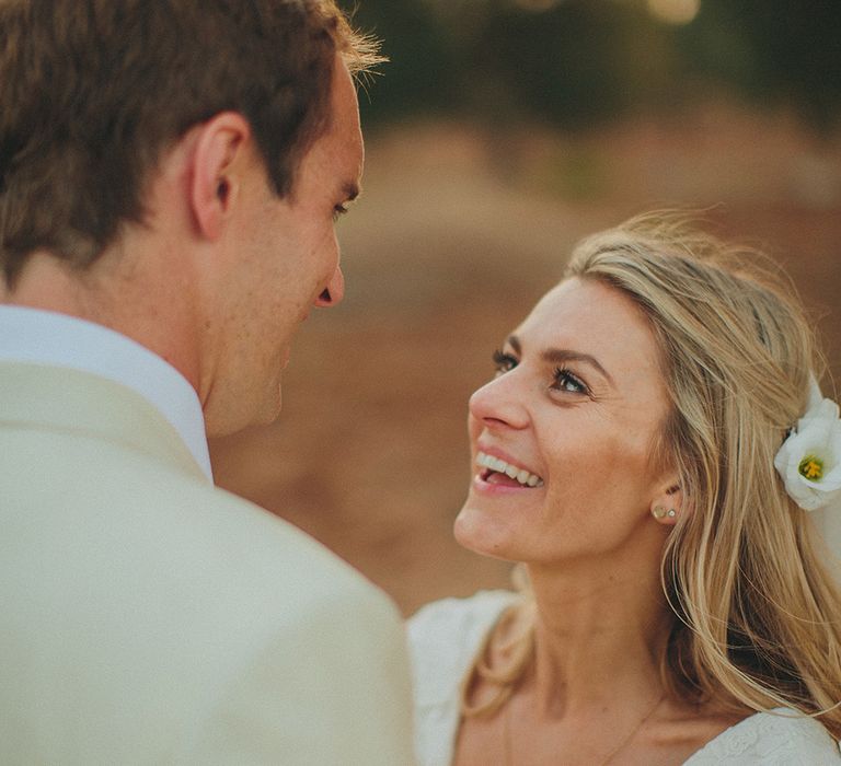 Bride in Custom Clemence Halfpenny London Bridal Gown | Groom in Cream Three Piece Suit | Brightly Coloured Destination Wedding at Masseria Potenti Wedding Venue, Puglia, South Italy | Petar Jurica Photography | Marco Odorino Film