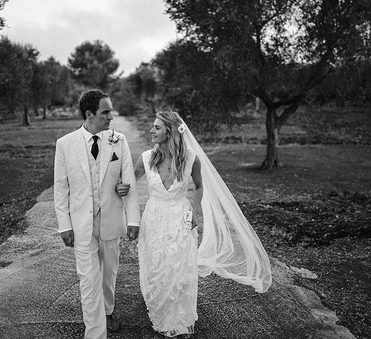 Bride in Custom Clemence Halfpenny London Bridal Gown | Groom in Cream Three Piece Suit | Brightly Coloured Destination Wedding at Masseria Potenti Wedding Venue, Puglia, South Italy | Petar Jurica Photography | Marco Odorino Film