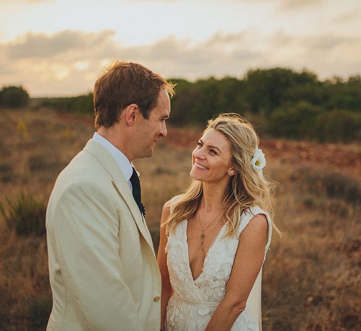 Bride in Custom Clemence Halfpenny London Bridal Gown | Groom in Cream Three Piece Suit | Brightly Coloured Destination Wedding at Masseria Potenti Wedding Venue, Puglia, South Italy | Petar Jurica Photography | Marco Odorino Film