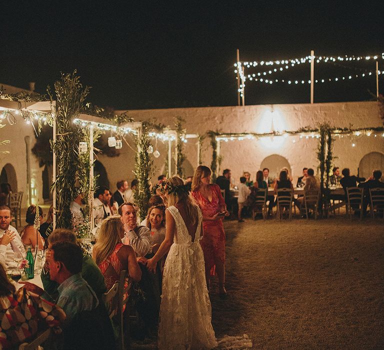 Outdoor Wedding Reception with Fairy Lights | Brightly Coloured Destination Wedding at Masseria Potenti Wedding Venue, Puglia, South Italy | Petar Jurica Photography | Marco Odorino Film