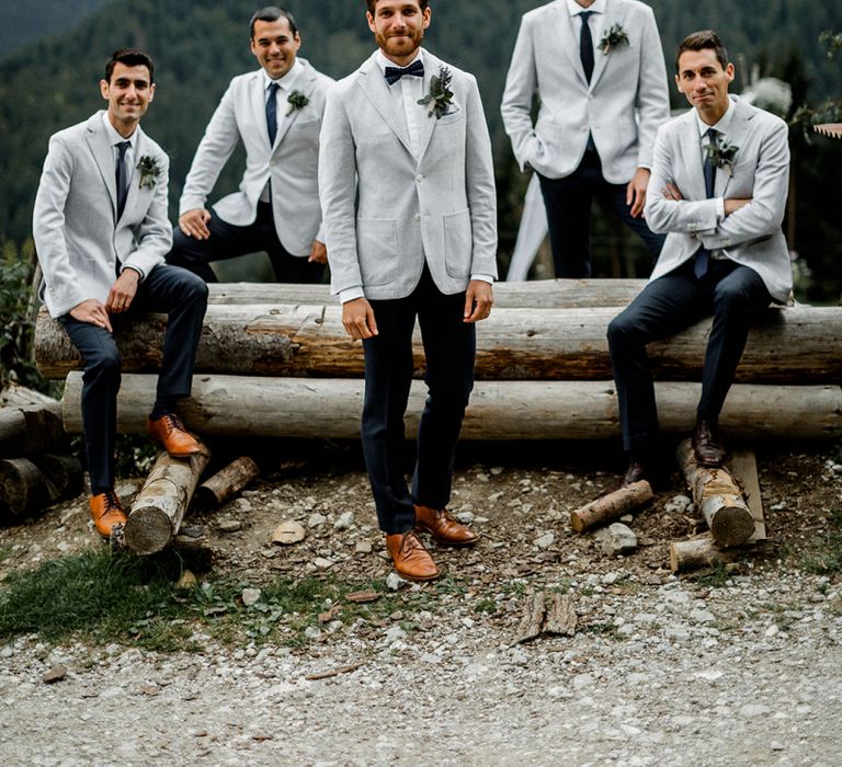 Groomsmen in Grey Blazers and Navy Chinos