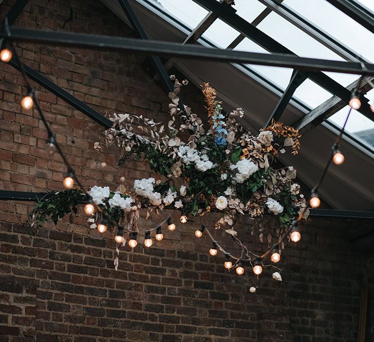 Floral Decor Hanging from Ceiling | Festoon Lights | Victoria Stakes Pub Wedding Reception | High Street Wedding Dress for an Intimate Crouch End Pub Wedding with Bright Flowers | Miss Gen Photography