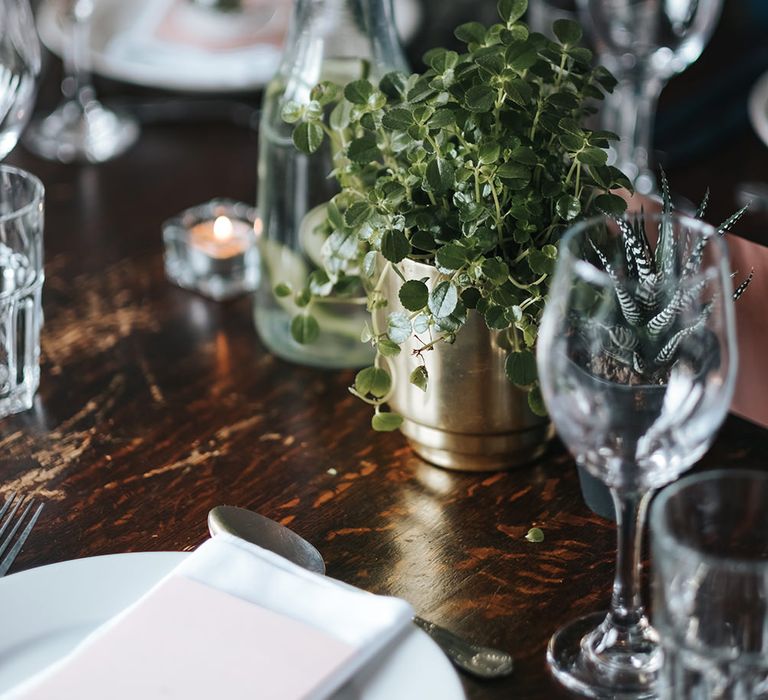 Pot Plant in Gold Vase | Victoria Stakes Pub Wedding Reception | High Street Wedding Dress for an Intimate Crouch End Pub Wedding with Bright Flowers | Miss Gen Photography