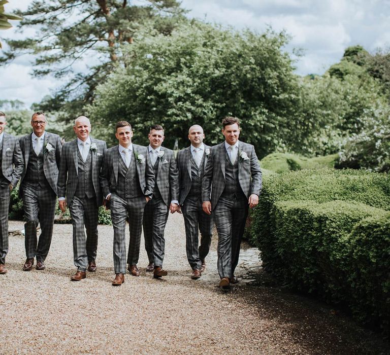 Groomsmen In  MatchingGrey Check Suits