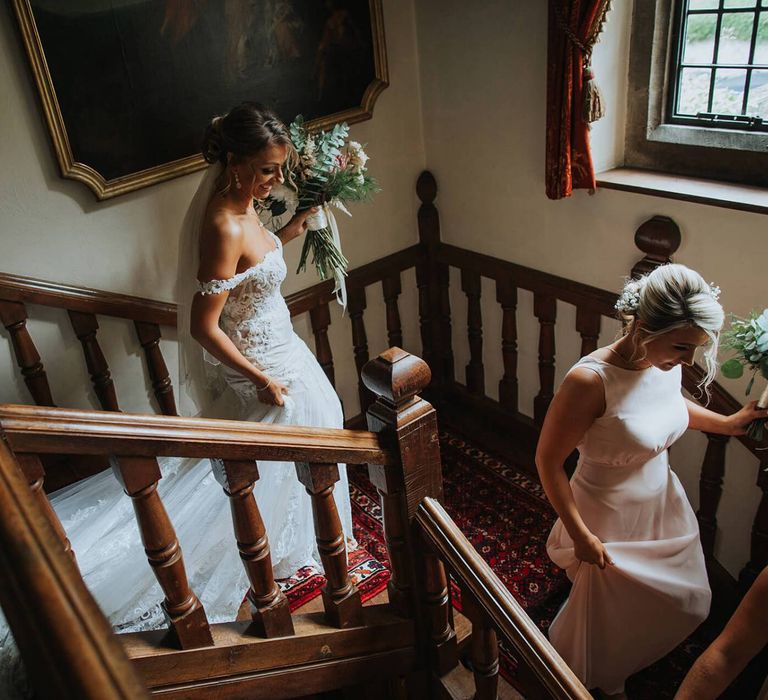 Bride Makes Her Way To Outdoor Ceremony In Off The Shoulder Dress