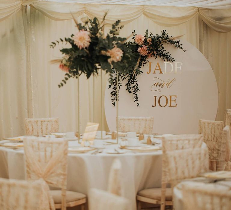 Wedding Table Set Up For Marquee Reception With Large Wedding Sign