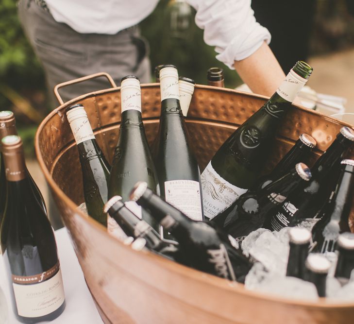 Wedding Reception Drinks with Bottles on Wine on Ice