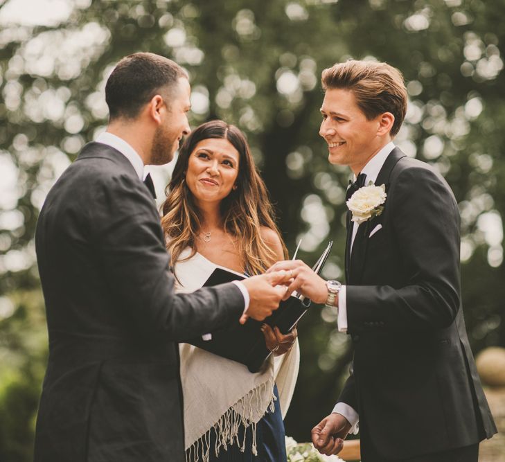 Groom and Groom Exchanging Vows at Worcestershire Wedding Venue Foxhill Manor