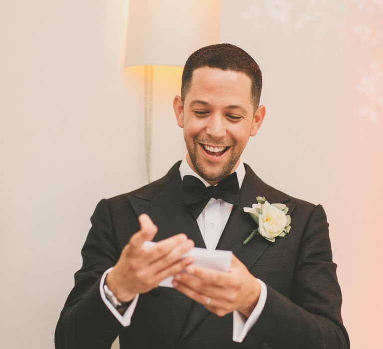 Groom in Tuxedo and Bow Tie Delivering His Wedding Speech