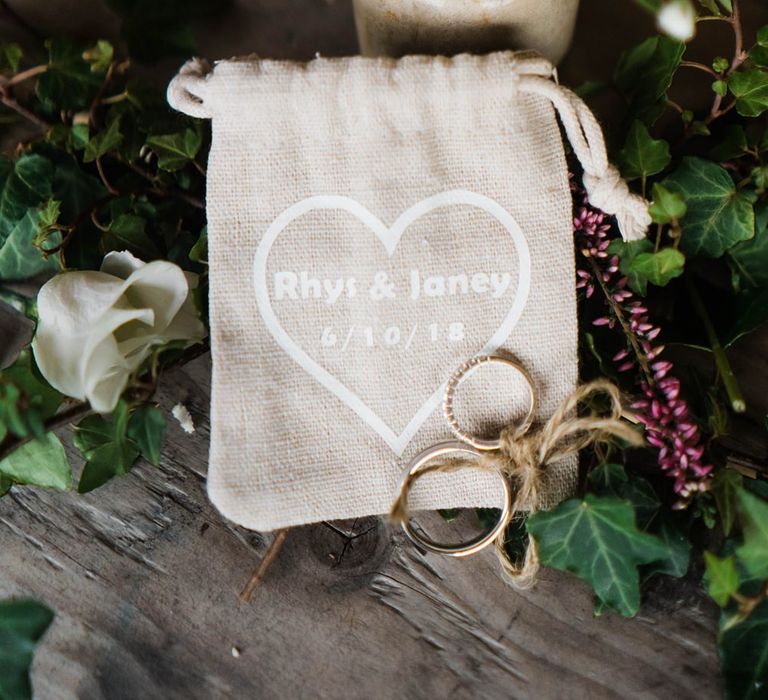 Wedding Rings Tied with Twine | Personalised Hessian Ring Bag | Lace KatyaKatya Dress for Tipi Wedding at Fforest Farm | Claudia Rose Carter Photography