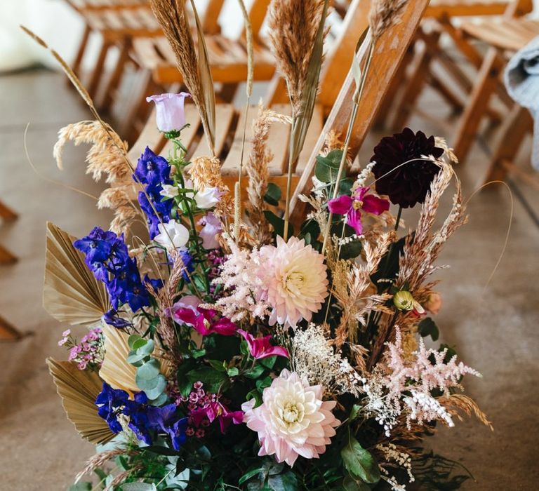 Vibrant floral aisle decor at dry hire wedding venue in London