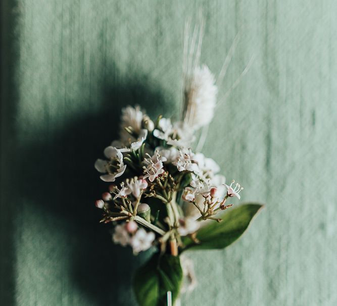 Delicate grooms buttonholes