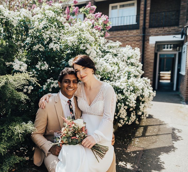 NHS Dr Annalan Navaratnam and Nurse Jann Tipping marry in the chapel of Guys and St Thomas Hospital in London amid Coronavirus pandemic by Rebecca Carpenter