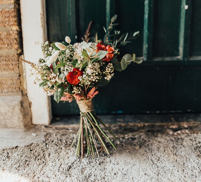 Red, white and green wedding bouquet