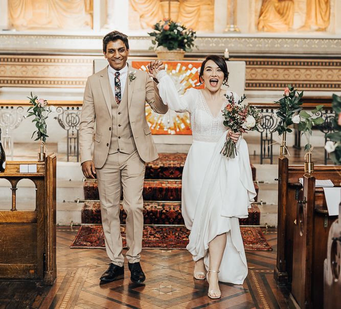 NHS Dr Annalan Navaratnam and Nurse Jann Tipping marry in the chapel of Guys and St Thomas Hospital in London amid Coronavirus pandemic by Rebecca Carpenter