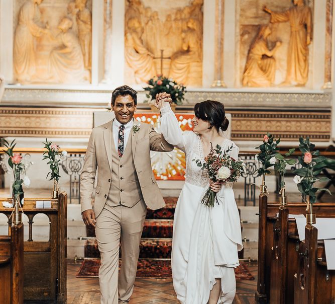 NHS Dr Annalan Navaratnam and Nurse Jann Tipping marry in the chapel of Guys and St Thomas Hospital in London amid Coronavirus pandemic by Rebecca Carpenter