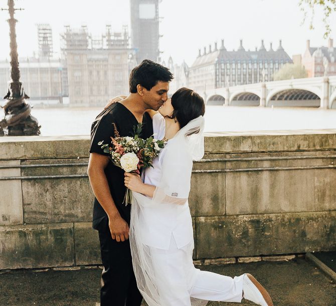 NHS Dr Annalan Navaratnam and Nurse Jann Tipping marry in the chapel of Guys and St Thomas Hospital in London amid Coronavirus pandemic by Rebecca Carpenter