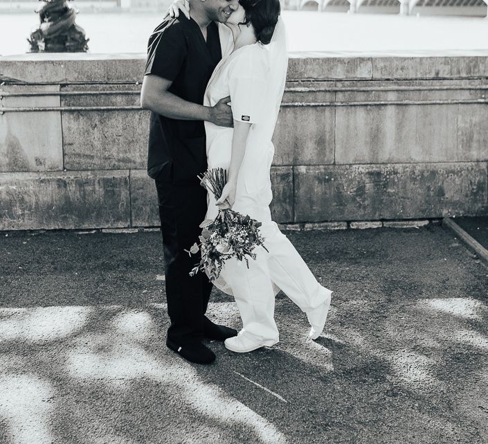 Doctor and Nurse in scrubs at wedding